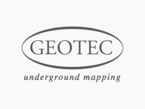 Logo of GEOTEC featuring the text "GEOTEC" in uppercase inside an oval outline, with "underground mapping" in lowercase script font below it. The design is in grayscale on a white background, highlighting their expertise across Surrey and Godalming.