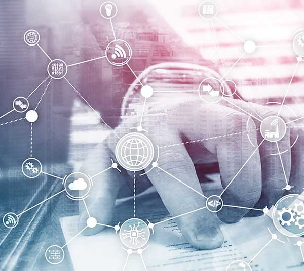 A hand touching a digital interface overlaid with a network of connected icons representing technology, communication, and data, symbolizing Supply Chain Management (SCM). The background is a blurred cityscape with buildings, creating a futuristic, interconnected atmosphere.