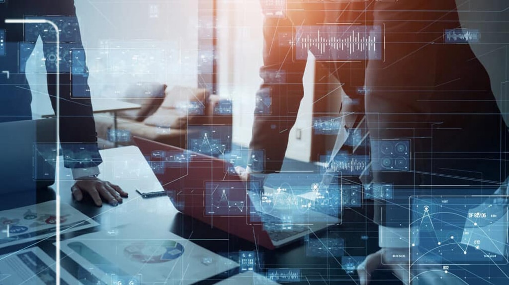 Two business professionals are standing at a desk with documents and a laptop in a modern office setting. Various data visualizations and infographics, symbolizing AI solutions for strategic planning in agriculture, are overlaid on the image.