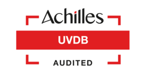 Logo with the text "Achilles UVDB Audited." A red rectangular band in the center displays "UVDB" in white, surrounded by black and red lines, signifying Achilles Utilities accreditation.